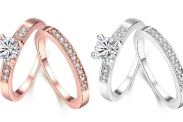 Fashion Rings: Your Guide to Statement Jewellry That Speaks Volumes Two sets of engagement or wedding rings on a white background: one in rose gold and one in silver, each featuring a solitaire ring with a clear stone and a matching band with smaller accent stones.